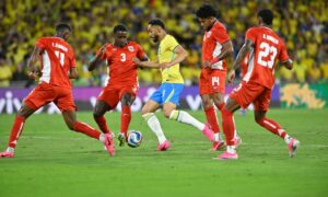 Former St Johnstone midfielder Victor Griffith plays against Brazil