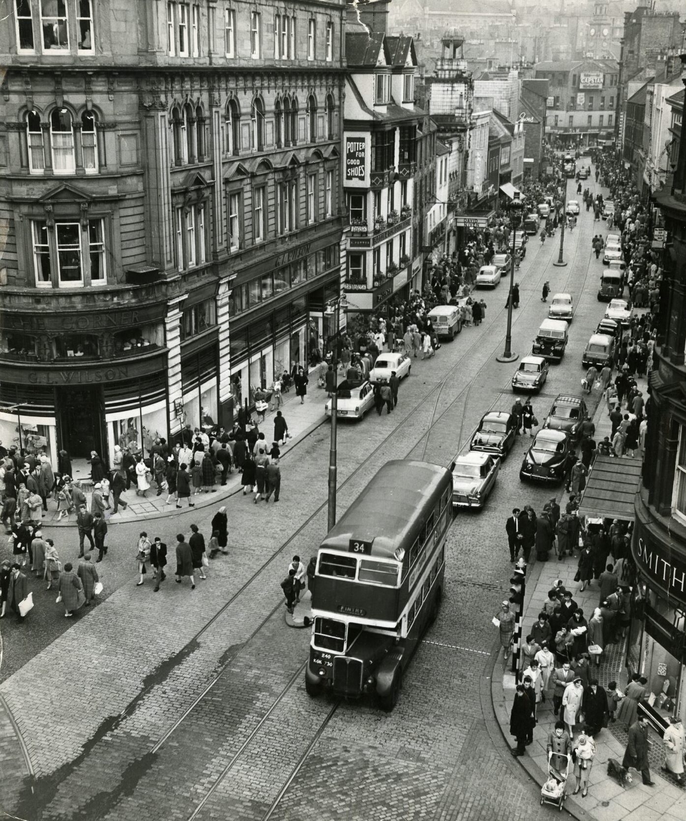 traffic and pedestrians in a Murraygate scene captured from above. 