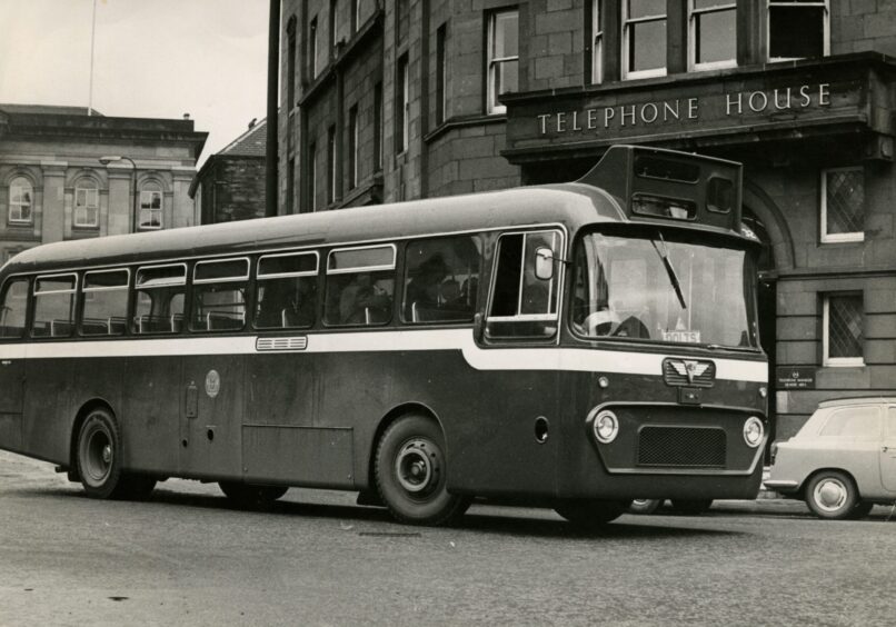 Dundee's first one-man bus, a single-decker, takes to the streets. 