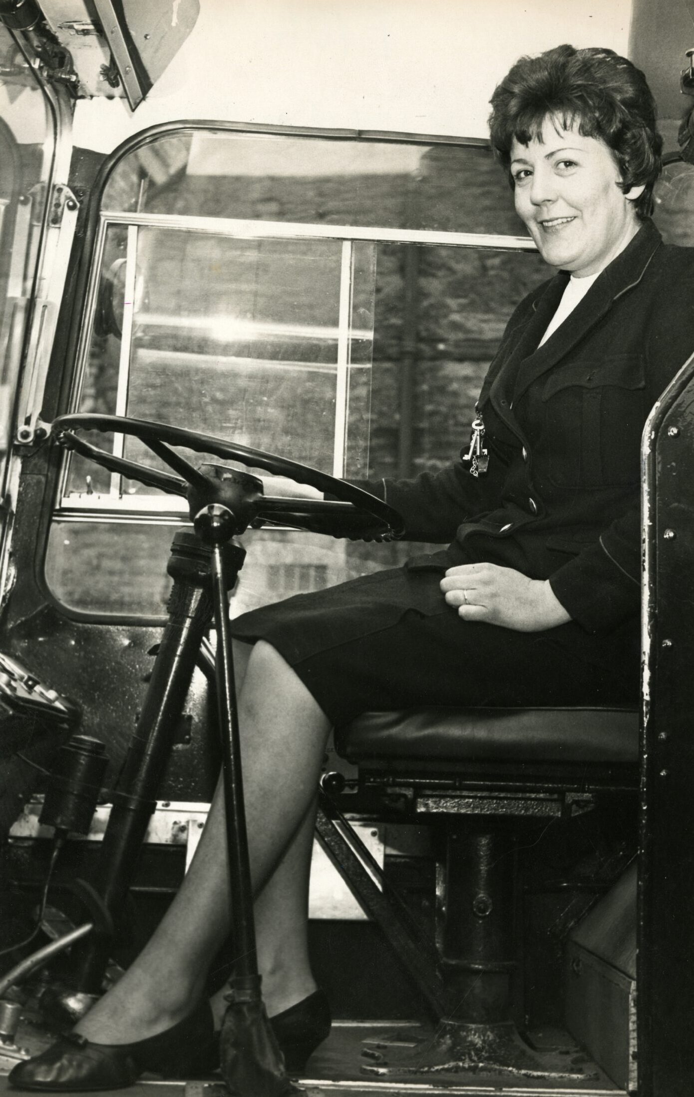 Pamela Scott at the wheel of an Alexander's bus.