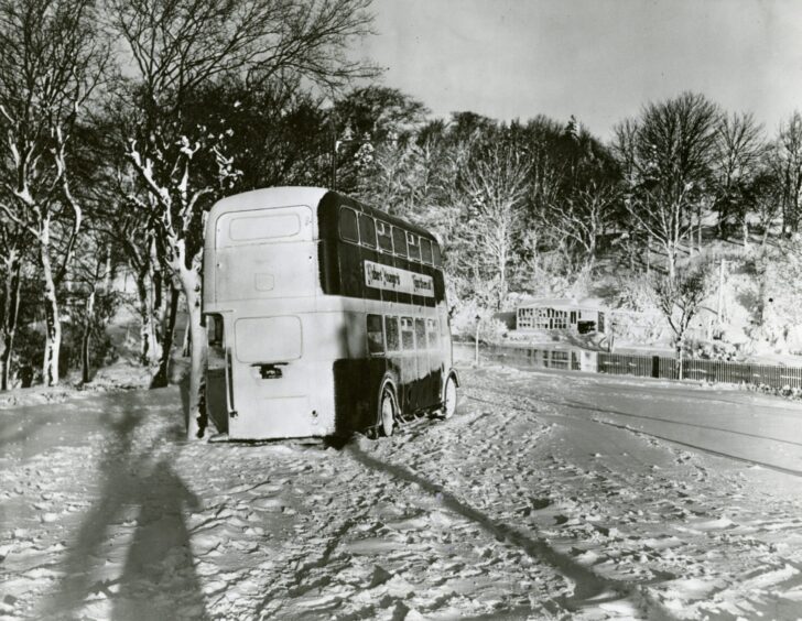 a school bus stuck in the snow