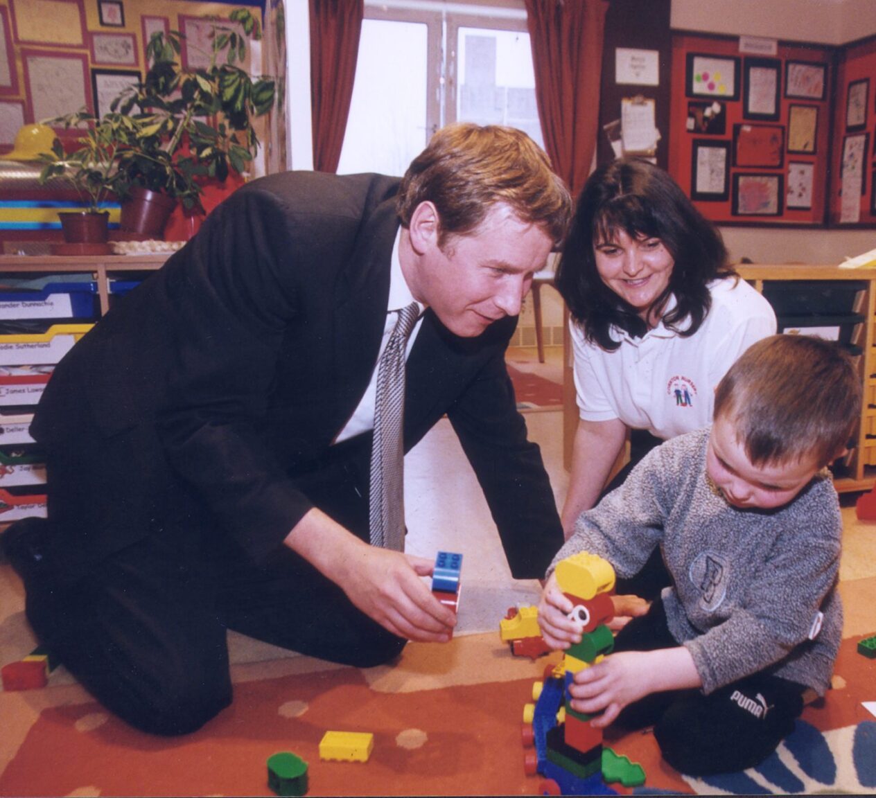 Photos of Stirling in 2001 show Sir Jackie Stewart and Tam Cowan