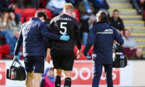 St Johnstone’s Zach Mitchell faces injury sweat as defender leaves McDiarmid Park on crutches