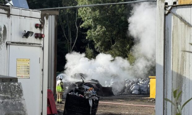 Smoke filled the air as firefighters battled the blaze. Image:  Lucy Scarlett/DC Thomson.