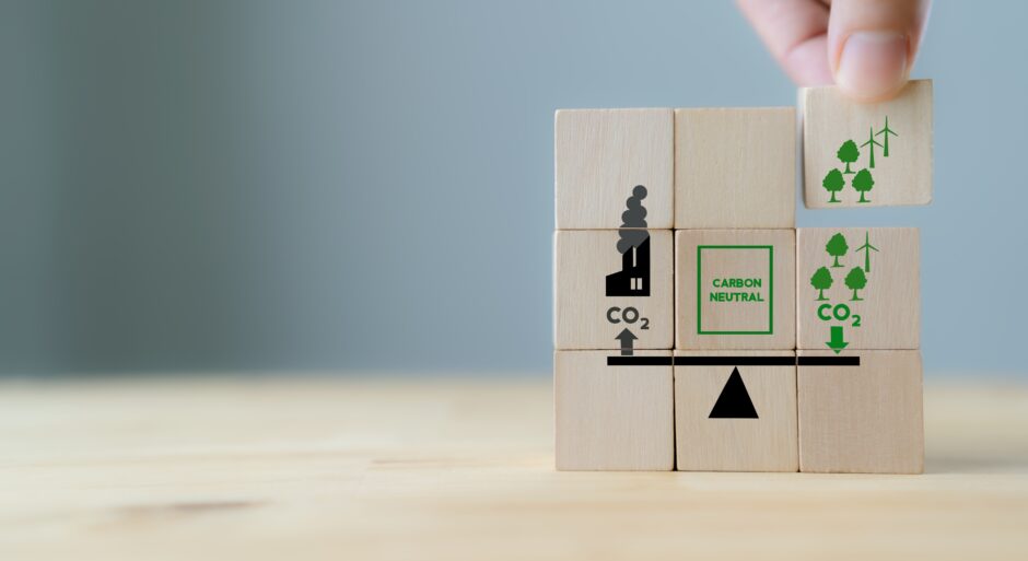 wooden blocks showing the cycle of carbon in the atmosphere