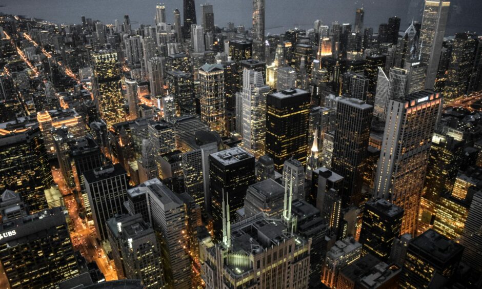 Aerial view of the city of Chicago at night.