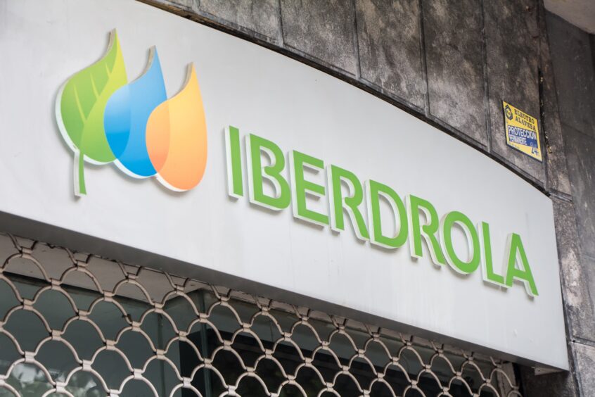 Iberdrola sign above closed roller grilles.