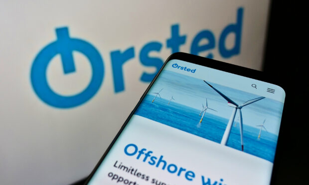 Orsted logo and phone showing an article about offshore wind.