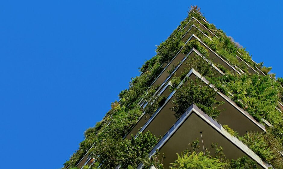 building with plants.