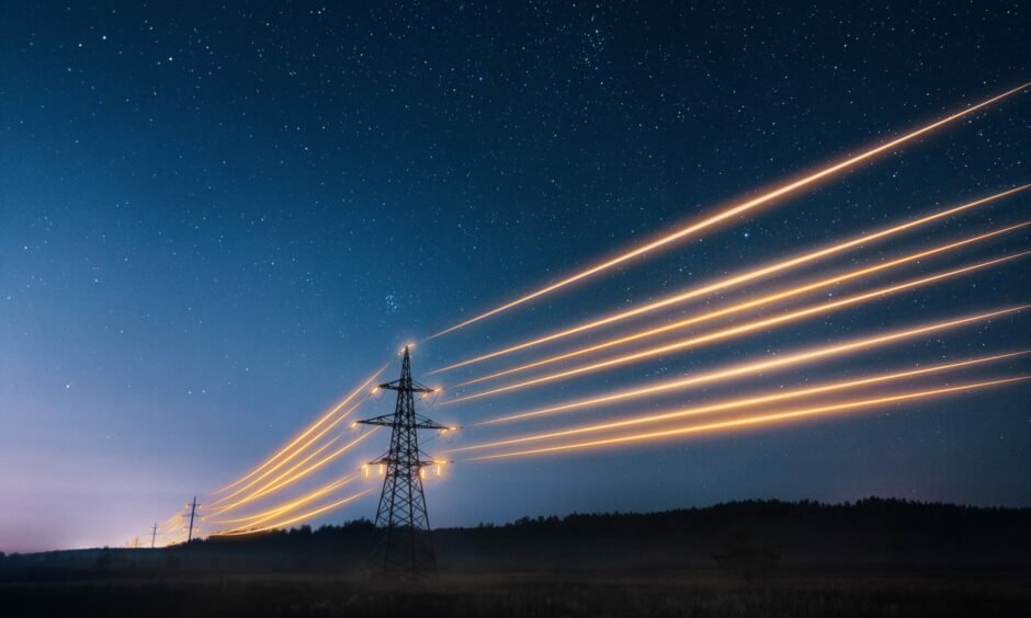 electricity transmission towers with orange glowing wires.