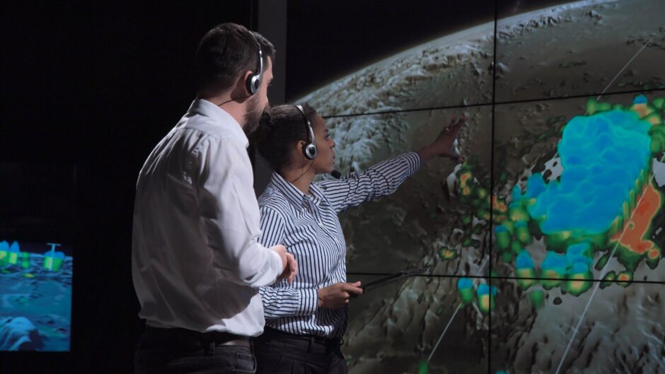Scientists viewing weather patterns