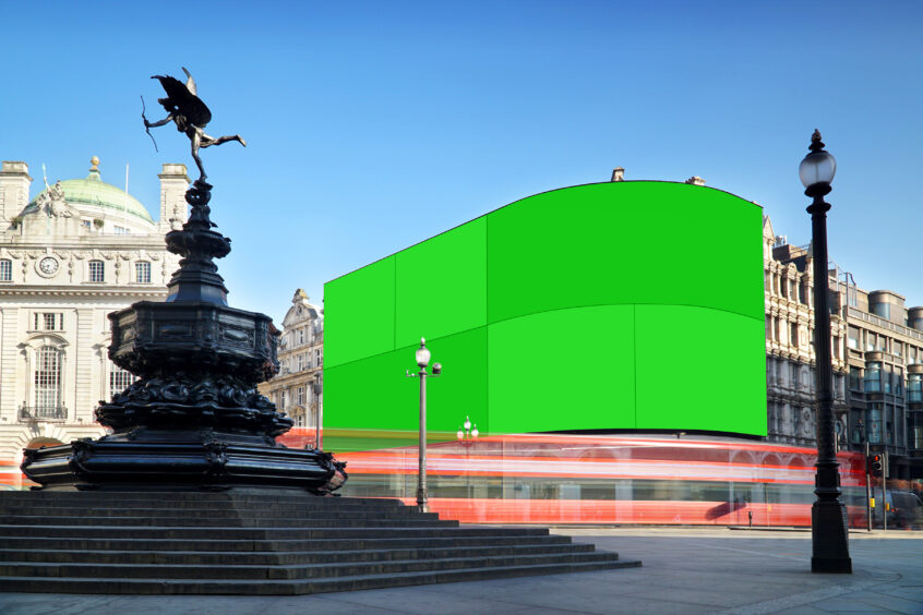 A european city square with green screens
