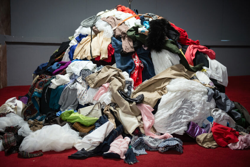 A mound of discarded clothes.