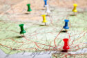 Map with scattered pins in various locations.