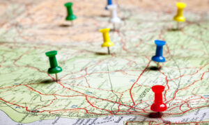 Map with scattered pins in various locations.