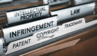 A filing cabinet of folders labelled as various types of intellectual property.