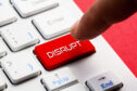 Keyboard showing a large red button, labelled"DISRUPT".