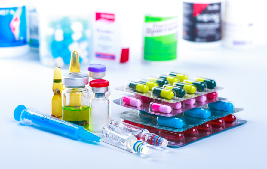 A selection of pharmaceutical products, each packaged in conventional plastic.