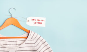 Striped t-shirt, labelled as 100% organic cotton.