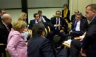 Gordon Brown, Barack Obama, and other world leaders talk at  Copenhagen summit in 2009