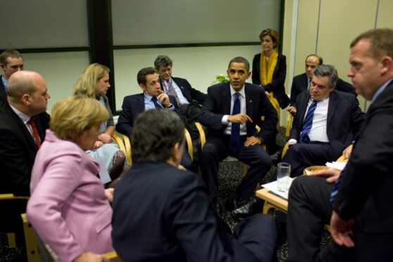 Gordon Brown, Barack Obama, and other world leaders talk at  Copenhagen summit in 2009