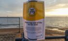 Warning signs along the seafront in Southend on Sea, advising people not to enter the water. Residents and visitors to the town on the river Thames estuary have been warned not to enter the water at three beaches following a sewage leak.