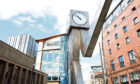 The Running Man clock in the city centre of Glasgow.