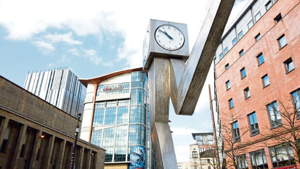 The Running Man clock in the city centre of Glasgow.