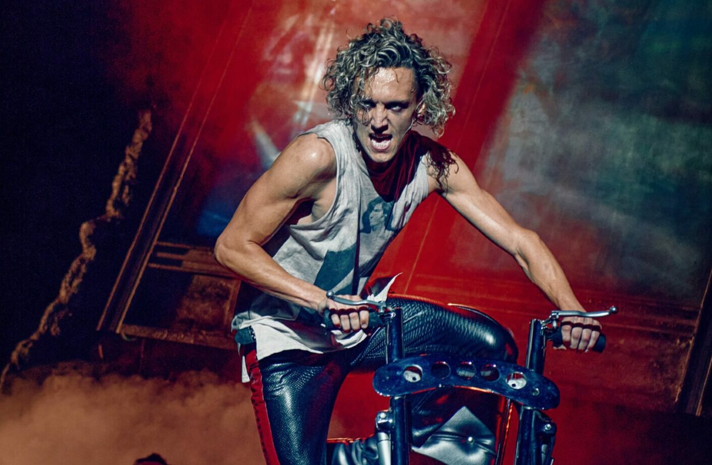 Glenn Adamson on stage as Strat in Bat Out Of Hell