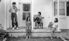 Townes Van Zandt on fiddle, far left, with fellow songwriters Susanna and Guy Clark and Daniel Antopolsky at the Clarks’ Nashville home in 1972.