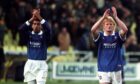 Colin Hendry with Giovanni van Bronckhorst after Rangers lost to Parma in the UEFA Cup in 1999