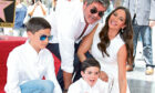 Simon Cowell and Lauren Silverman with sons Eric Cowell and Adam Silverman.