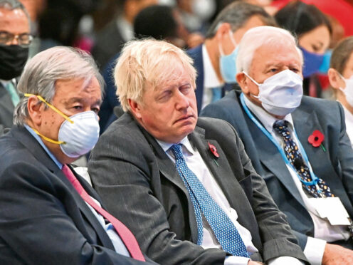 Secretary-General of the United Nations António Guterres, British prime Minister Boris Johnson and Sir David Attenborough during the opening ceremony for the Cop26 summit at the Scottish Event Campus (SEC) in Glasgow.
