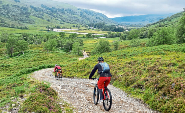 Cyclists take in one of the stunning routes around Ullapool