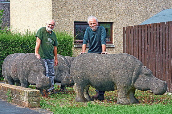 Mark Bonnar with one of the concrete Glenrothes hippos, crafted by his dad Stan.