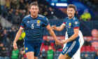 John Souttar and Kieran Tierney celebrate the Hearts man’s goal against Denmark.