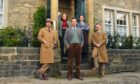 Nicholas Ralph, centre, as vet James Herriot in Grassington, which doubles as fictional Darrowby, with All Creatures co-stars.