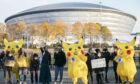 Life-sized 'Pikachu' characters joined activists from the No Coal Japan coalition, at Pacific Quay opposite the Glasgow COP26 campus