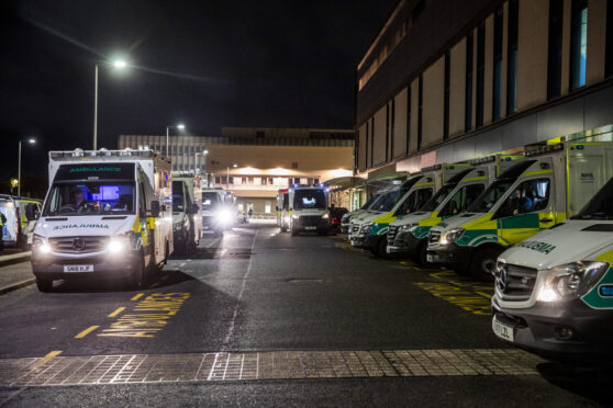 Ambulances wait outside A&E at the Queen Elizabeth University Hospital in Glasgow in November 2021 when we described how 15 were queuing to drop-off patients at 6pm on a Monday night