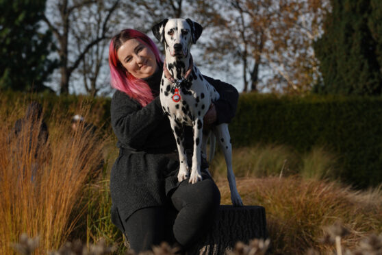 Kaylee Hughes and her dog Poppet