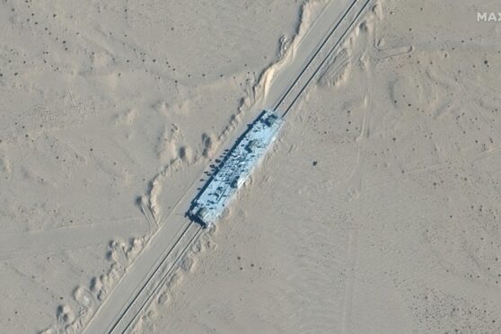 A satellite image of mocked-up US aircraft carrier in Chinese desert