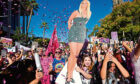 Confetti falls on Britney Spears supporters outside a hearing concerning the pop singer's conservatorship at the Stanley Mosk Courthouse, in Los Angeles.