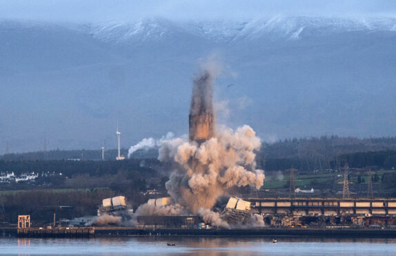 The 600 foot high chimney stack at Longannet Power Station in Fife is brought down by controlled explosion