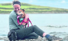 Alexis Fleming with Ginger, one of the hundreds of pets she cares for at Maggie Fleming Animal Hospice in Kirkcudbright