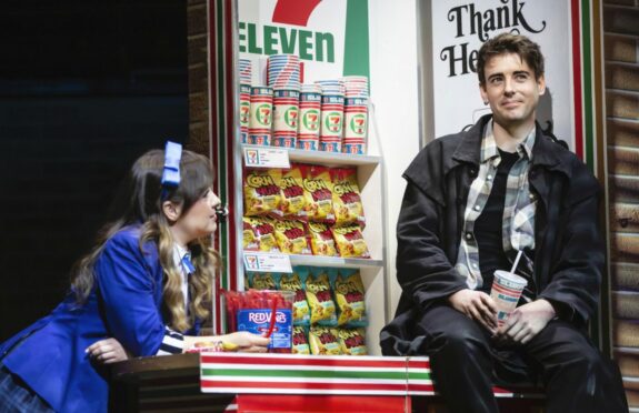 Rebecca Wikes and Simon Gordon as Veronica and J.D. on stage in a scene from Heathers The Musical