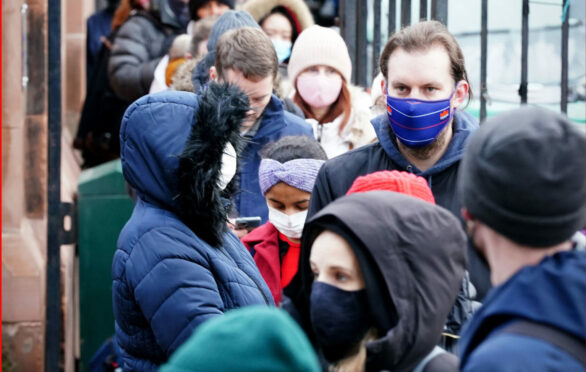 People queue at a vaccination centre in Leith, Edinburgh, last week