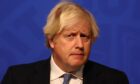 Boris Johnson at a press conference in Downing Street on Wednesday after ministers met to consider imposing new Covid restrictions