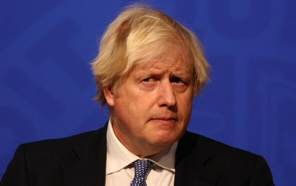 Boris Johnson at a press conference in Downing Street on Wednesday after ministers met to consider imposing new Covid restrictions