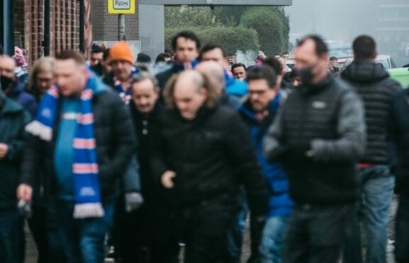 Rangers fans leaving Ibrox subway station heading for the match against Dundee United