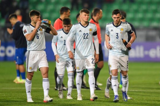 £11-million Nathan Patterson is flanked by Kieran Tierney and Andy Robertson while on Scotland duty